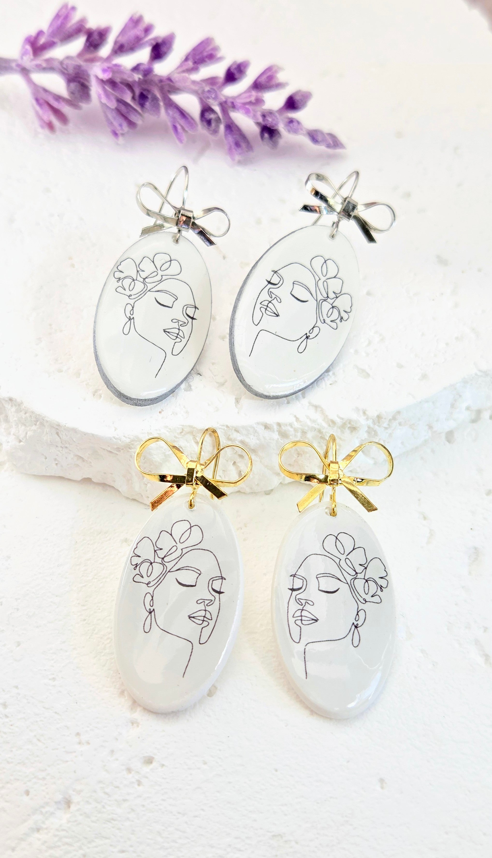 Abstract Face Clay Earrings with Bow Accent