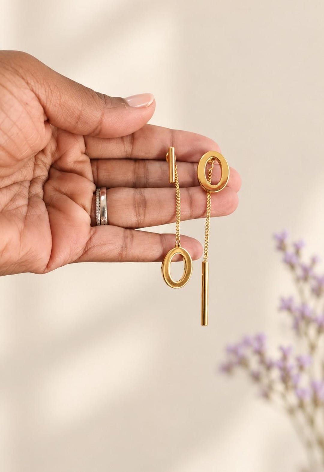 Asymmetrical gold drop earrings
