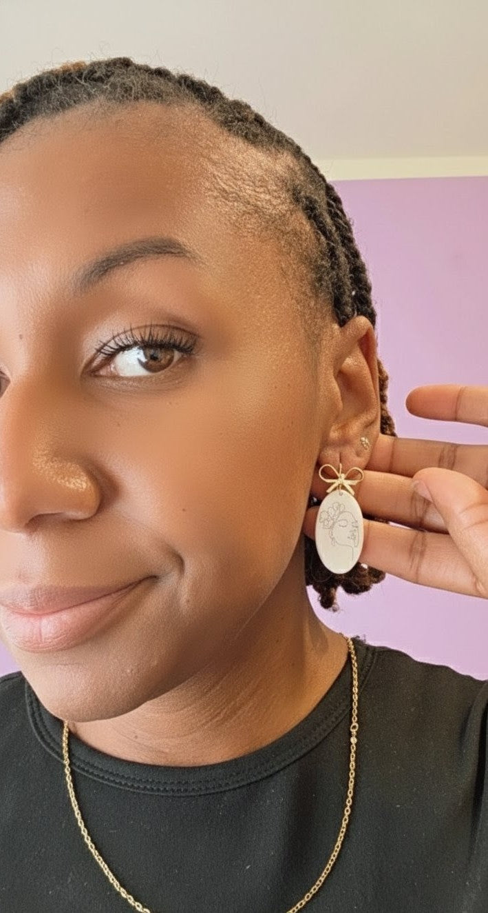 Abstract Face Clay Earrings with Bow Accent