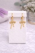 Elegant Bow Huggie Earrings- 18k Gold and Sterling Silver